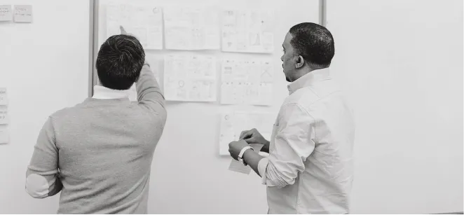 Won at a whiteboard with another designer